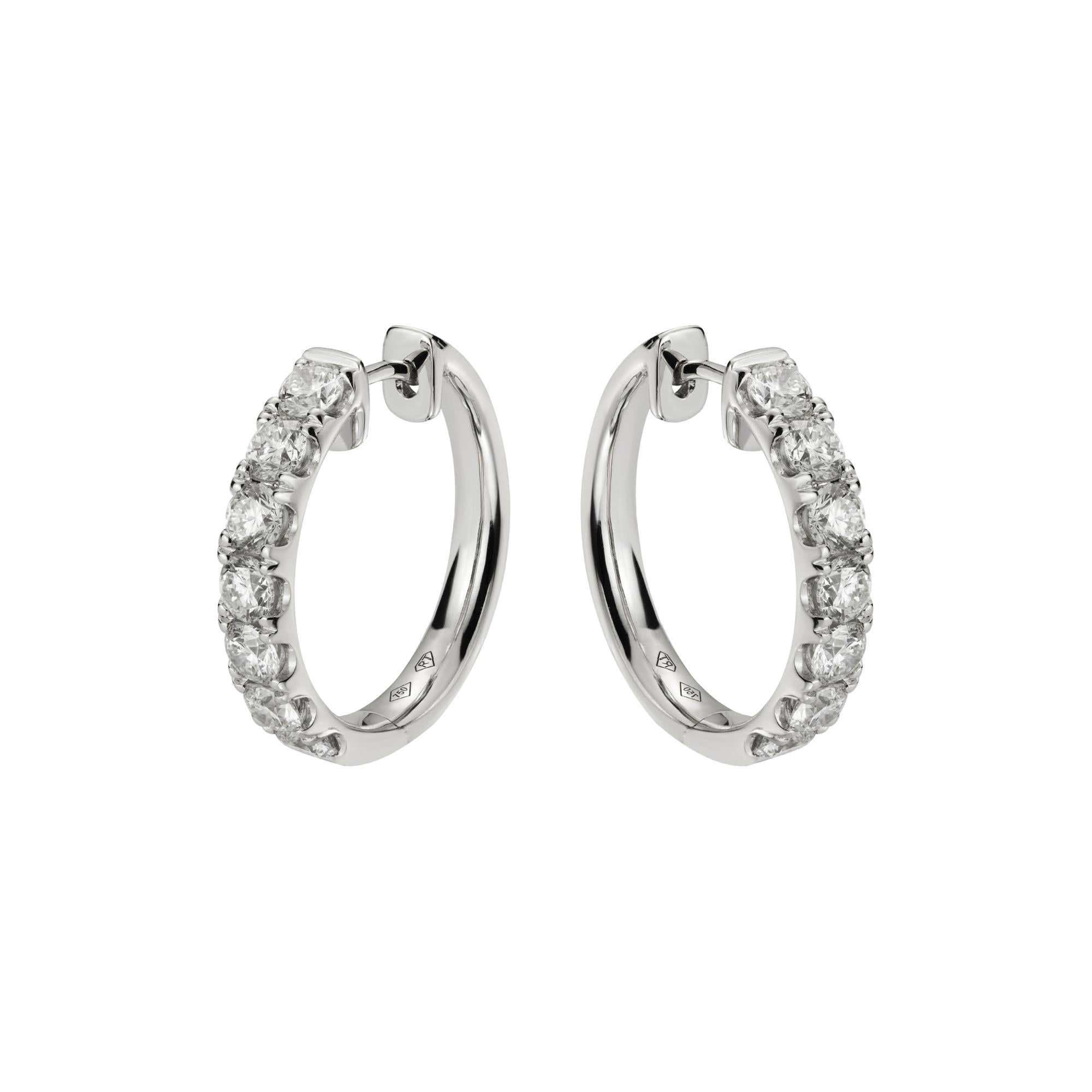 18ct White Gold Seven Stone Diamond Claw Set Oval Hoops