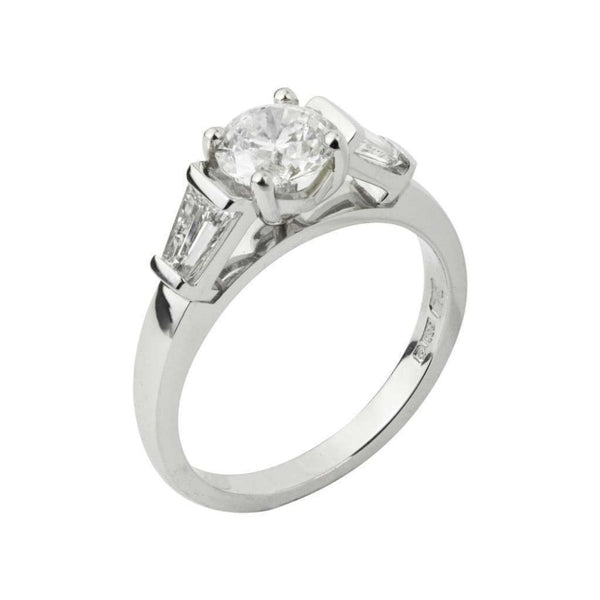 Finnies The Jewellers Platinum Solitaire Diamond Ring with Taper Diamond On Each Shou